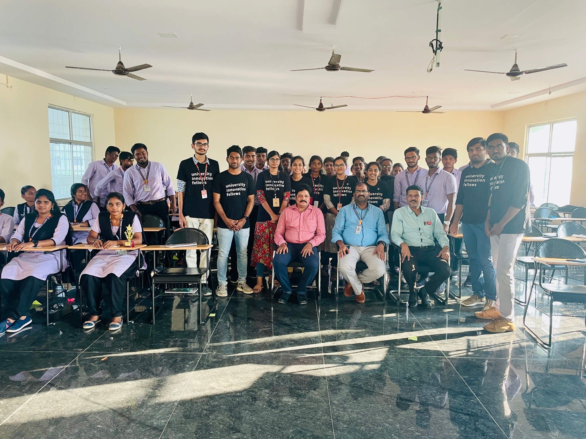 UIF team with students and faculty in a classroom setting